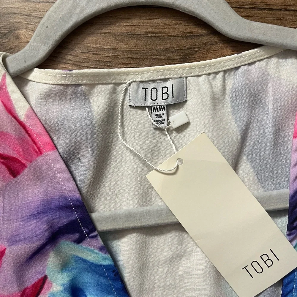 New with tags!! Beautiful floral romper 🌸🌸🌸 - Picture 3 of 4